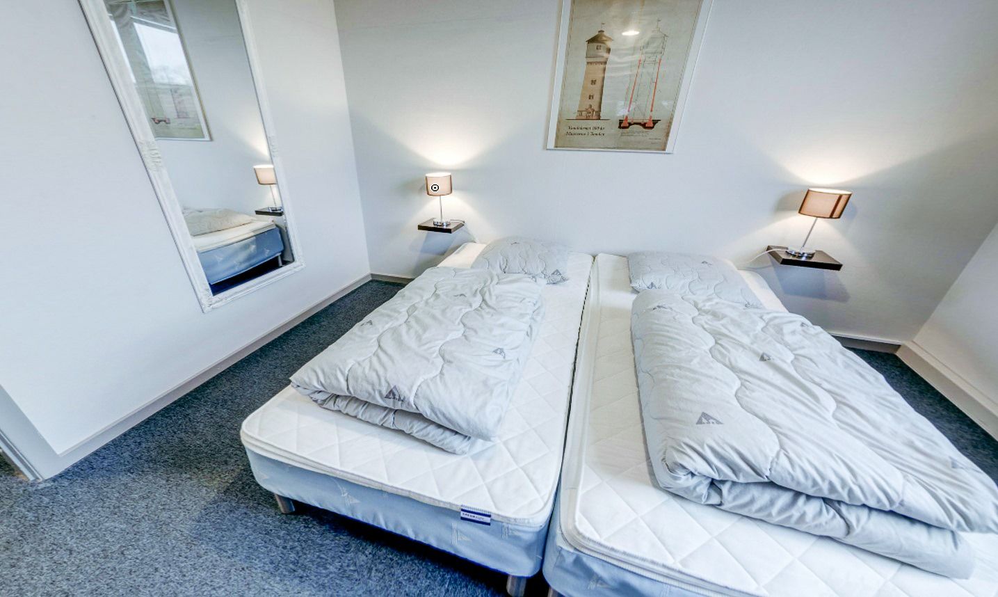 Sportzentrum Tondern Doppelzimmer mit nicht-bezogenen Betten
